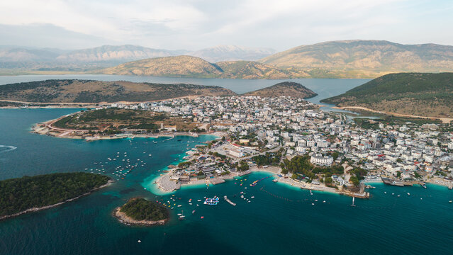 Aerial Panorama of Ksamil Bays Beaches and Mountain Coastline