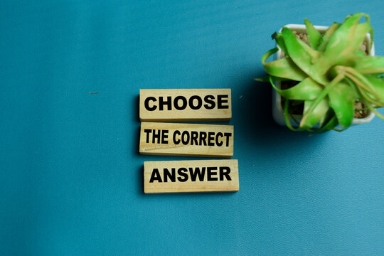 Choose the correct answer text stacked wooden cubes on the table. For questionnaire test and survey voting option