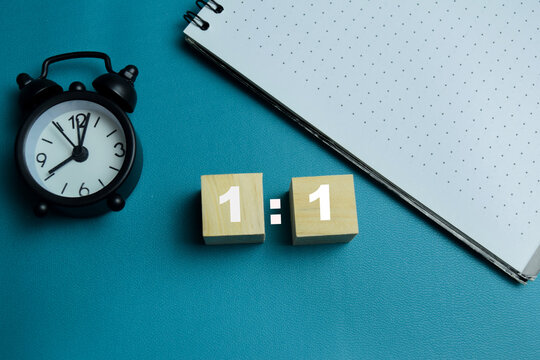 Concept of one to one ratio text on wooden blocks. For financial and strategy