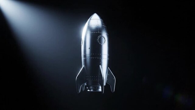 Minimalist metallic rocket ship in spotlight and dark background