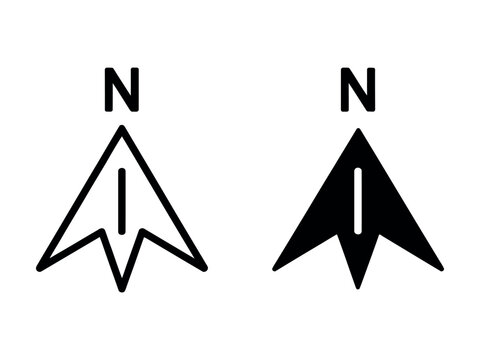 North directional compass needle pointers with black lines and symbols.
