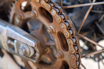 Close up of a chain and sprocket on a motorcycle