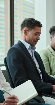 Notebook, queue and business people in office for job interview, meeting or corporate training. Happy, waiting and candidate in line for career opportunity, vacancy or recruitment in workplace.