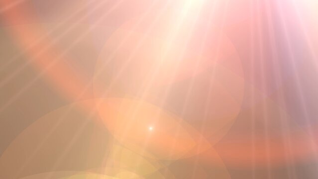 A vibrant, warm-toned image capturing bright sunlight with lens flare and light rays during sunset or sunrise