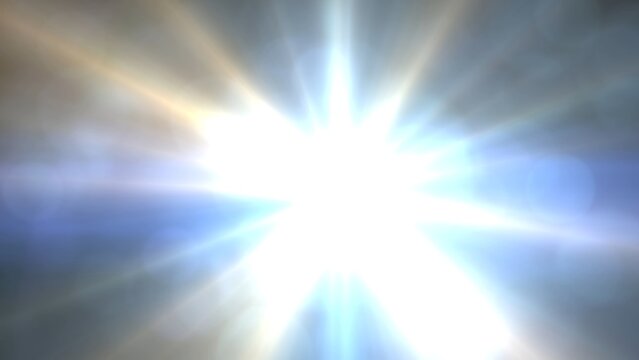 A bright sunburst radiates through a partially cloudy sky, creating a stunning display of light, flare, and atmospheric glow across a natural outdoor scene.
