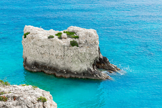 tropic region nature top view from drone of stone cliff object from the tranquil blue water sea environment