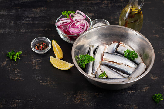 Raw Sardines Ready for Cooking with Herbs and Seasonings