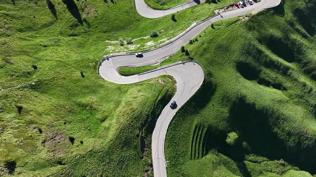 Aerial Top Down View of Winding Serpentine Mountain Road at Passo Sella in Italian Dolomites