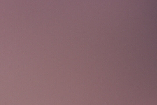 Soft colorful sunset gradient with atmospheric grain and blurred texture for modern abstract background design and decorative visual compositions