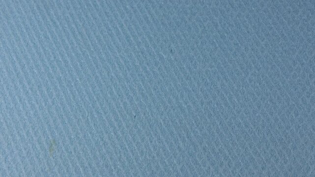 Blue Textured Extruded Polystyrene Insulation Foam insulation board with visible texture, fine surface relief and rigid foam structure used in construction and thermal insulation.