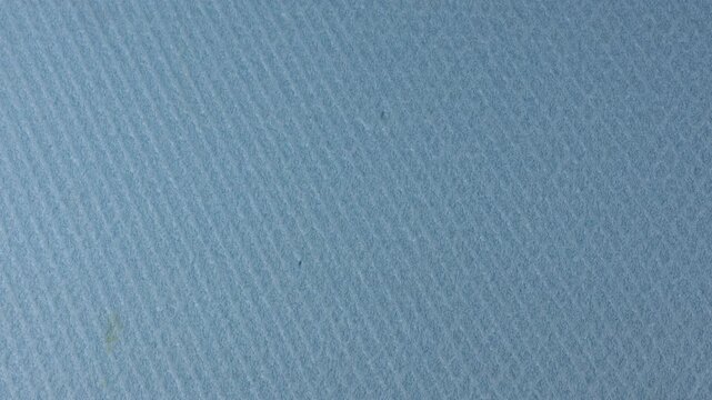 Blue XPS Insulation Foam Macro Texture extruded polystyrene insulation showing enlarged surface texture, fine relief and dense rigid foam detail for construction and material backgrounds.