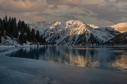 Big Almaty Lake in the Trans-Ili Alatau mountains early on a late autumn morning.