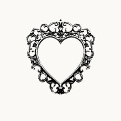 Obraz premium Ornate heart-shaped frame with intricate black floral patterns.