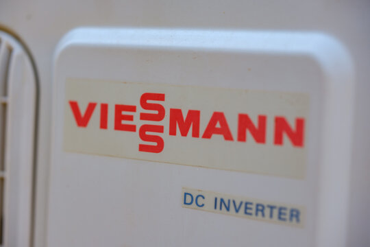 Viessmann brand logo and DC Inverter label printed on the white casing of an outdoor heat pump air conditioning split system compressor unit