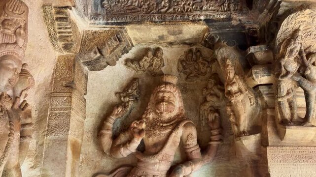 Ancient stone carvings inside the Badami Cave Temples in Karnataka, India, showcasing intricate craftsmanship and historic Indian rock-cut architecture