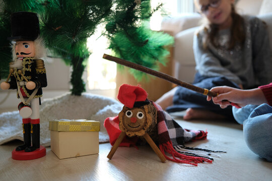 Children celebrating catalan ti&oacute; de nadal tradition