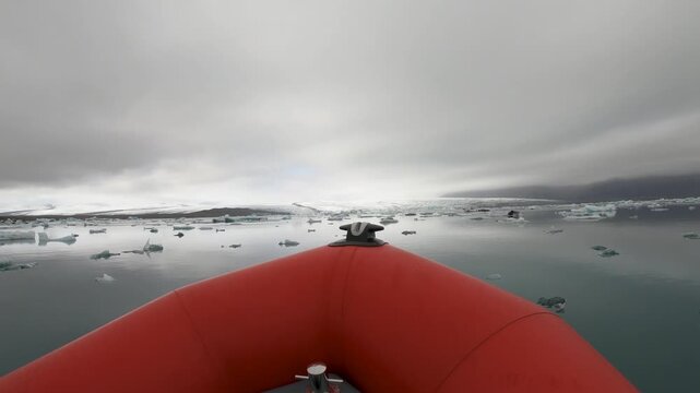 Floating melting icebergs in Jokulsarlon lagoon, Iceland view from a speed boat