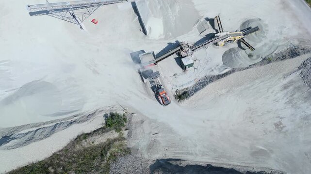 Panoramic aerial orbit around an industrial glass recycling and sorting plant in Lincolnshire, UK