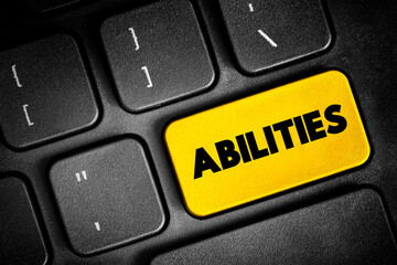 Obraz premium Abilities - possession of the qualities required to do something, necessary skill, competence or power, text button on keyboard, concept background