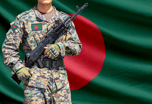 Bangladesh flag with soldier holding assault rifle