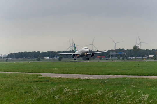 Aer lingus Airplane landing at schiphol Airport. Amsterdam, The Netherlands.