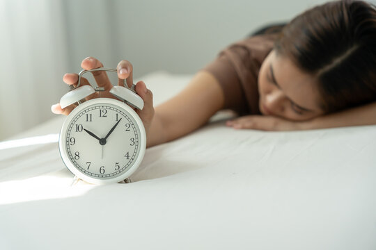 Asia young woman sleep late, lady is late appointment or work or class study, overslept, difficulty get up in mornings, time worried, not on time, sleepy, over due, over due