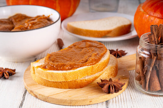 Homemade Spiced Pumpkin Butter, Tasty vegetable smooth, flavorful fall spread for toasts and sandwiches. Delicious pumpkin puree with fall seasonal spices