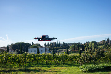 Obraz premium Personal eVTOL aircraft flying over Italian vineyard landscape