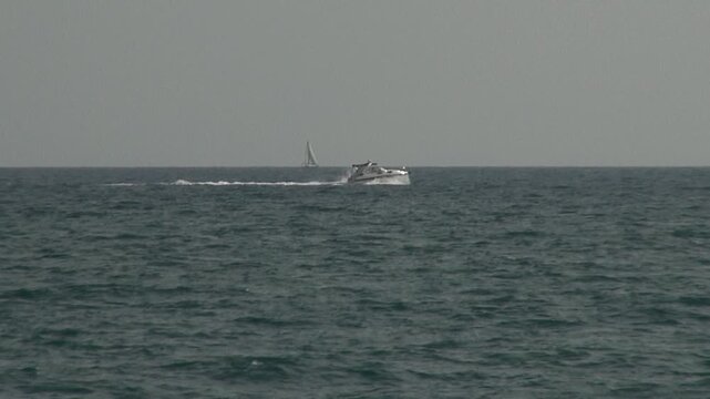 Speedboat motorboat sailboat ship speed white ocean sea water sky waves