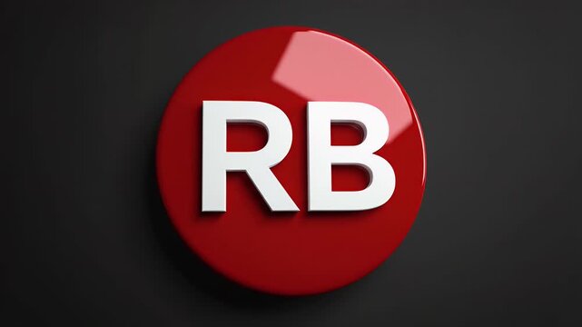 Close-Up Red Circular Logo Badge with White RB Letters Mounted Against a Dark Wall