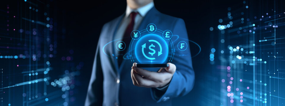 Businessman holding smartphone with Currency Exchange icons on screen. Business and Finance concept