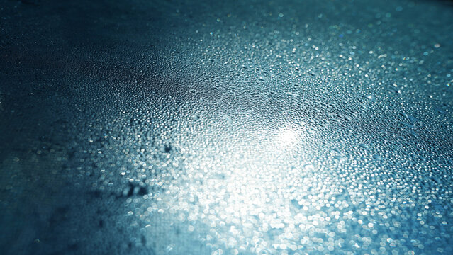 Cold Glass Surface with Dew Drops and Condensed Steam