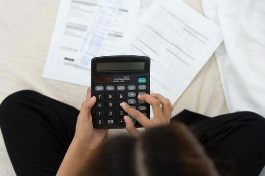 Stressed and headache woman calculate bills and invoices, No money to pay to expenses and credit card debt. shortage, Financial problem, bankruptcy, mortgage, loan, bankrupt, poor, empty wallet