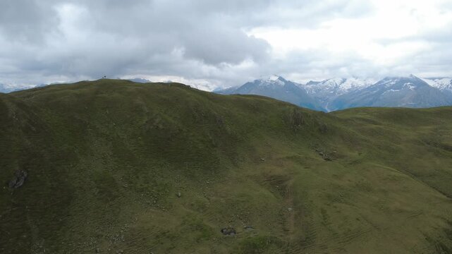 Stunning Aerial Panorama of Koenigsleiten Mountains and Lush Green Valleys Under Cloudy Skies
