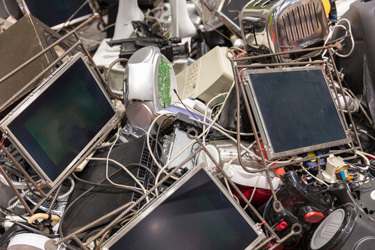 Pile Of Discarded Electronic Waste Including Monitors Keyboards And Other Devices For Recycling Or Environmental Concepts