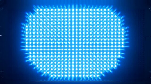 Blue LED Light Array Expanding Across a Dark Electronic Grid Panel