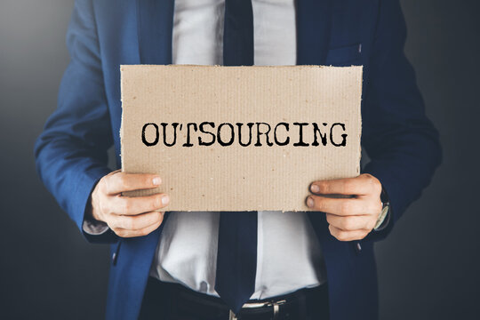 OUTSOURCING word written on paper