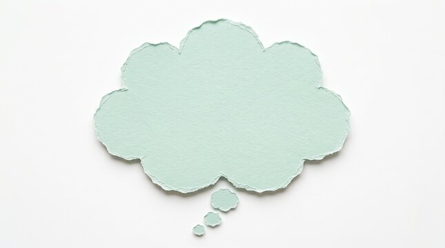 A pale green thought bubble shaped paper cutout with torn edges isolated on a white background for creative design or conceptual messaging