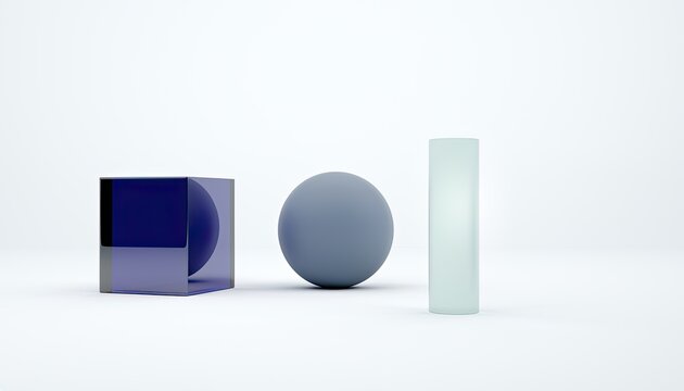 Three geometric shapes of varying colors and transparencies are arranged on a white surface.