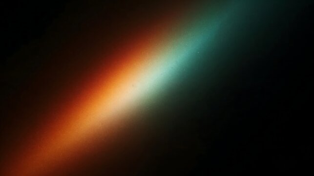 Abstract diagonal beam of light with a soft gradient transition from warm orange to cool teal on black background