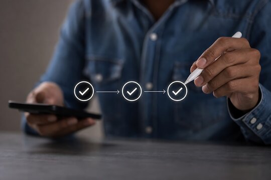 Person checking off items on a list with digital checkmark icons and holding a smartphone