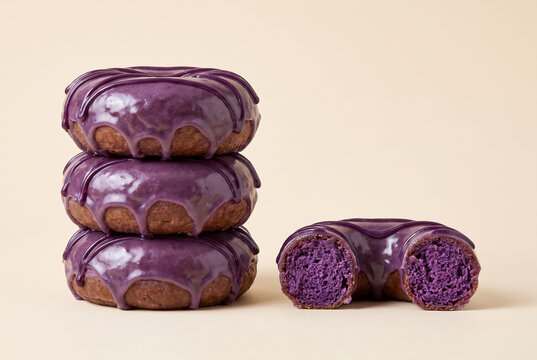 Stacked Ube Donuts With Purple Glaze