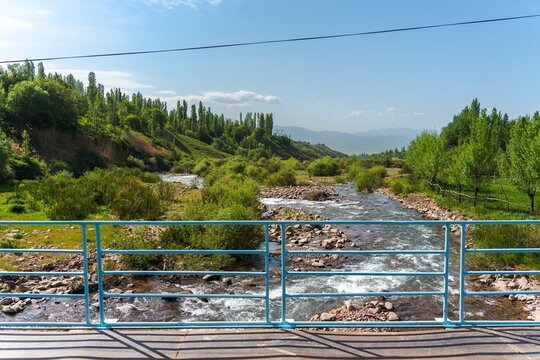 Karabau stream view from bridge in sunny morning, Angren, April