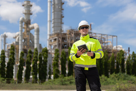 Petroleum engineer working at oil refinery site