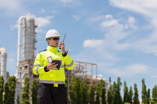 Petroleum engineer working at oil refinery site