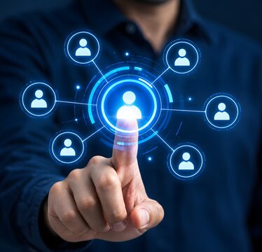 Person's finger touching a futuristic digital interface displaying a central glowing user icon connected to a network of other user icons.