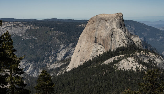Half Dome Rises Over The Surrounding Area of Yosemite