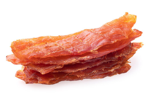 Stack of smoked chicken meat slices, meat chips jerky, isolated on white background, studio shot