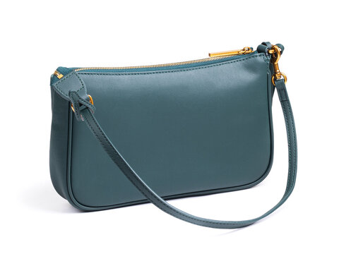 Women's dark teal green leather crossbody bag with gold hardware isolated on white background, studio shot