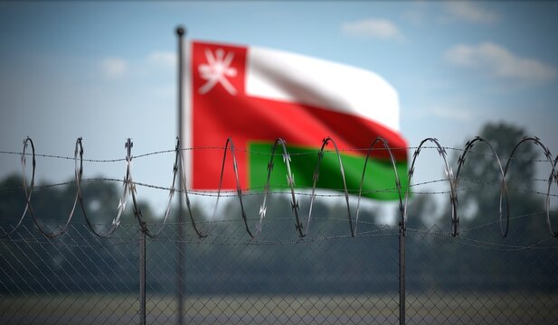 Oman - Flag and Barbed Wire Fence - 3D illustration